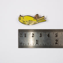 Load image into Gallery viewer, A closeup picture of the dead canary enamel pin and a ruler showing that the pin is 3.5cm in length on a white background.