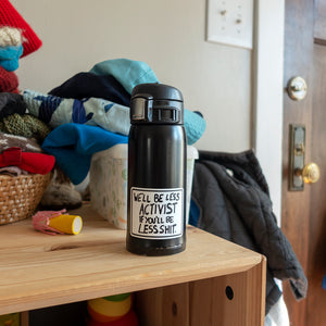 'we'll be less activist if you'll be less shit' protest poster vinyl sticker on travel mug